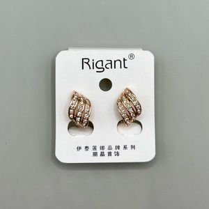 Elegant gold earrings with small crystals
